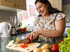 Woman cutting vegetables